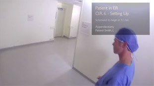 Вид при ношении Google Glass - врач идет по коридору, а показатели жизненных функций пациента отображаются в правом верхнем углу.