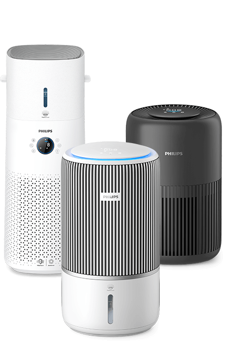 Набір очищувачів повітря Philips, що стоять поруч